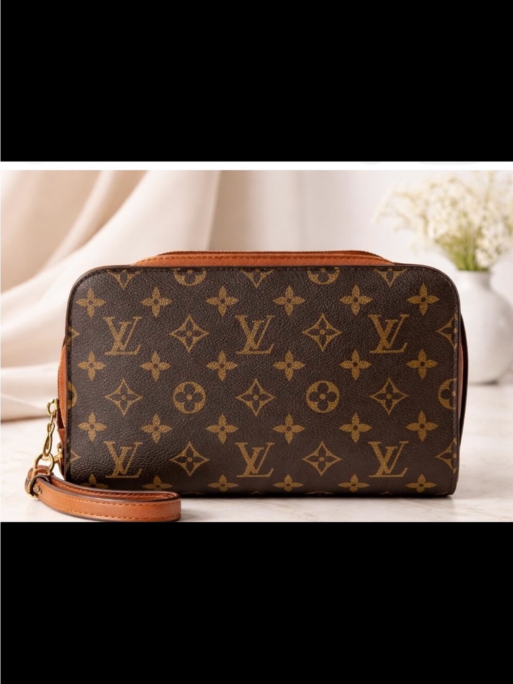 Louis Vuitton Orsay Monogram Wristlet